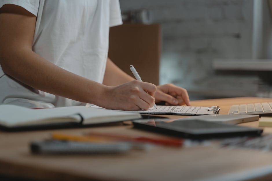 Accountant reviewing printed receipts with client