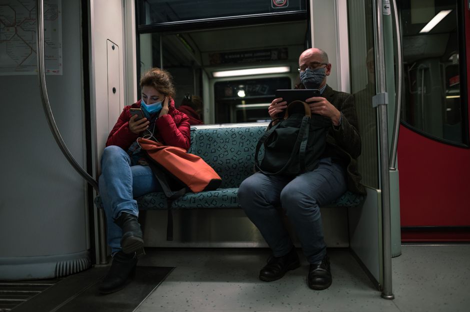 commuter watching phone