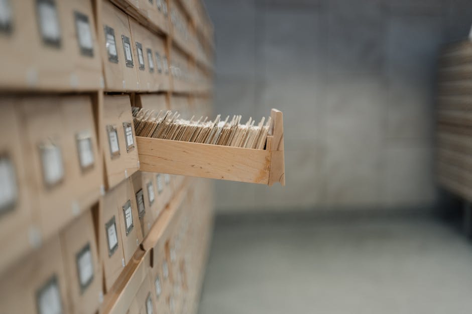 Receipts, smartphone, and laptop on a small business desk