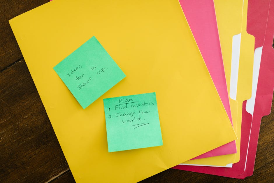 Receipts, smartphone, and laptop on a small business desk