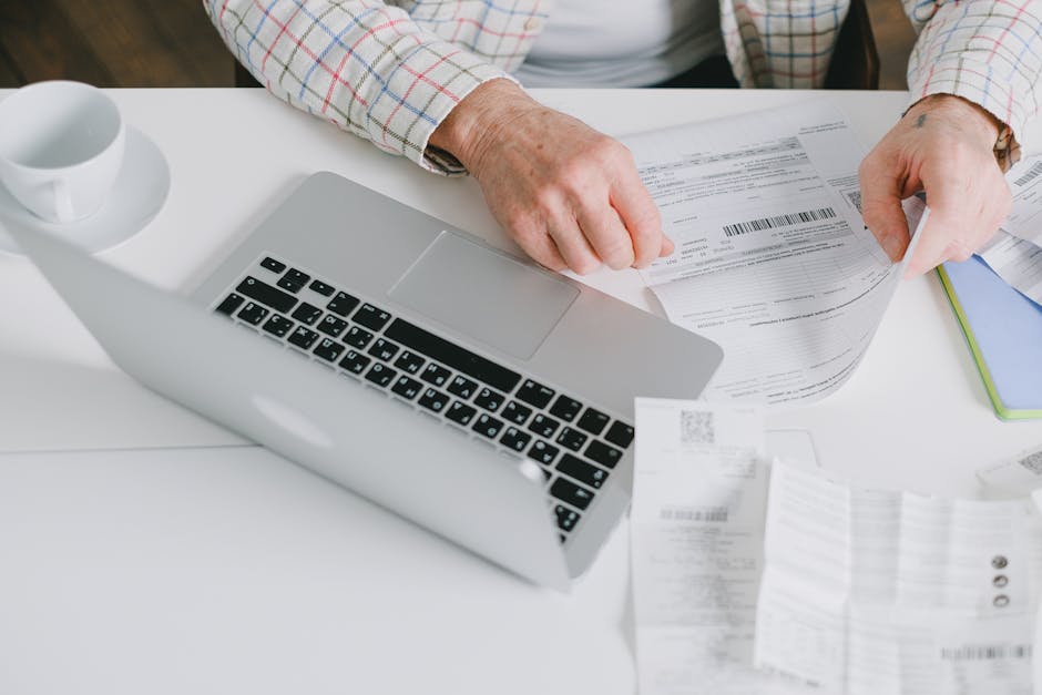 Receipt on desk with phone ready to scan
