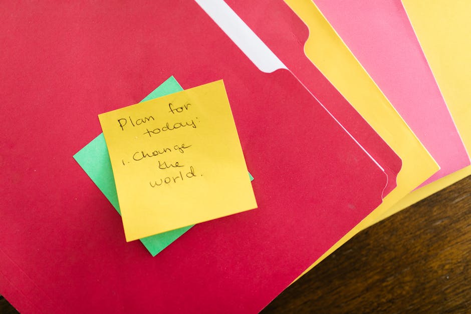 Receipts, smartphone, and laptop on a small business desk
