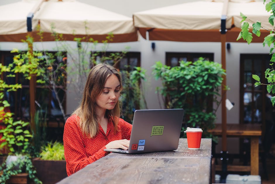 Receipts, smartphone, and laptop on a small business desk